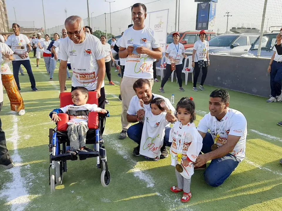 Families and volunteers at a Cure SMA India community run